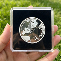 Boîte à capsules pour pièces de monnaie transparente carrée 60 x 60 mm en plastique acrylique avec anneau en EVA noir