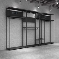 Porte-vêtements mural modulaire en métal noir et or de luxe pour boutique de robes de mariée et magasin de détail
