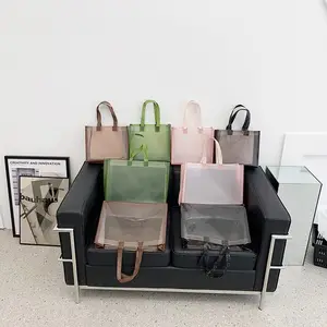थोक उच्च गुणवत्ता वाले पीवीसी टोट बैग कपड़े की पैकिंग के लिए वाटरप्रूफ पीवीसी पारदर्शी बैग कस्टम लोगो पीवीसी शॉपिंग बैग