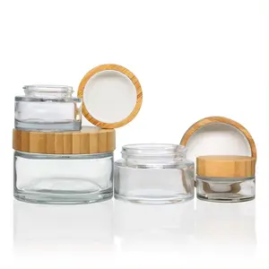 Commercio all'ingrosso 1oz 2oz 3oz 4oz 5oz 6oz barattoli di vetro cosmetico con coperchi di bambù ermetici