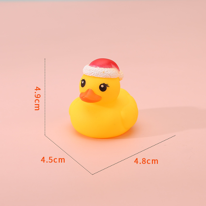 Canard à capuche rouge de Noël