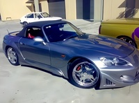 Kit carrosserie aérodynamique TOPMIX pour Honda S2000 AP1, style Veilside, comprenant pare-chocs avant, pare-chocs arrière, jupes latérales et extensions d'ailes.