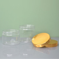 Kunststoffdose auf Lager Kosmetik-Creme-Verpackung 200g 300g 500g 800g 1000g Transparente Weithalsflasche mit Galvanisiertem Golddeckel