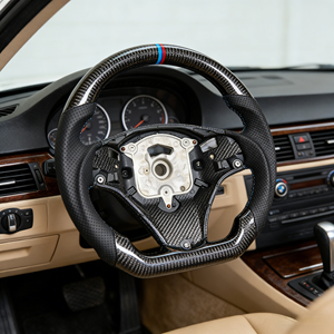 Volante in Fibra di Carbonio di Alta Qualità per <span class=keywords><strong>BMW</strong></span> Serie <span class=keywords><strong>E</strong></span>, Serie 1, Serie 3, X1, <span class=keywords><strong>X5</strong></span>, X6, E70, E71, E84, E87, E90 - Product Image 1