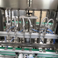 Machine de remplissage de liquide de bouteille en verre de type linéaire entièrement automatique pour boisson de jus lait vin de raisin vin rouge liqueur yaourt