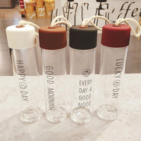 Bouteille d'eau en verre givré tendance avec poignée en corde pour l'extérieur, bouteille d'eau transparente portable