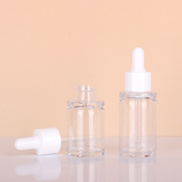 Flacon compte-gouttes carré en PET transparent de 10 ml, flacon cosmétique personnalisé avec impression sérigraphique pour l'emballage d'huiles essentielles et de soins de la peau