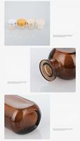 Bouteille diffuseur à roseaux en verre de 50 ml avec surface givrée, bouchon en caoutchouc et étiquettes sérigraphiées pour parfum d'intérieur