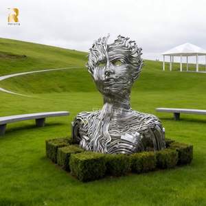 Photo en niveaux de gris d'une statue à visage humain photo – Photo