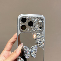Coque de téléphone de luxe pour iPhone 17 Pro Max avec strass papillon en TPU+PC, design miroir personnalisé pour femme, protection de l'appareil photo, compatible iPhone 16