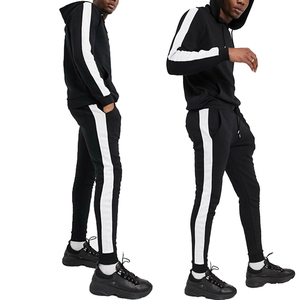 Uniformes Deportivos <span class=keywords><strong>de</strong></span> Invierno para Hombre, Tallas Grandes, con Logotipo Personalizado, <span class=keywords><strong>de</strong></span> Alta Calidad y Bajo Precio, Conjuntos Deportivos <span class=keywords><strong>de</strong></span> Poliéster/Algodón para <span class=keywords><strong>Fútbol</strong></span> y Baloncesto - Product Image 1