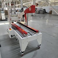 Machine de scellage semi-automatique pour boîtes en carton, scellage thermique, ruban BOPP, entraînement électrique, haute productivité, équipement pour boissons, certifiée CE