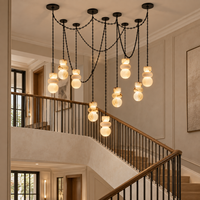 Lustre en acier noir personnalisé avec chaîne, lampe suspendue pour plafond haut, hôtel, villa, multi-lumières