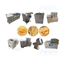 Machine à couper les frites et les chips de pommes de terre croustillantes avec friteuse et stérilisateur alimentaire automatique haute capacité pour usine de transformation de snacks