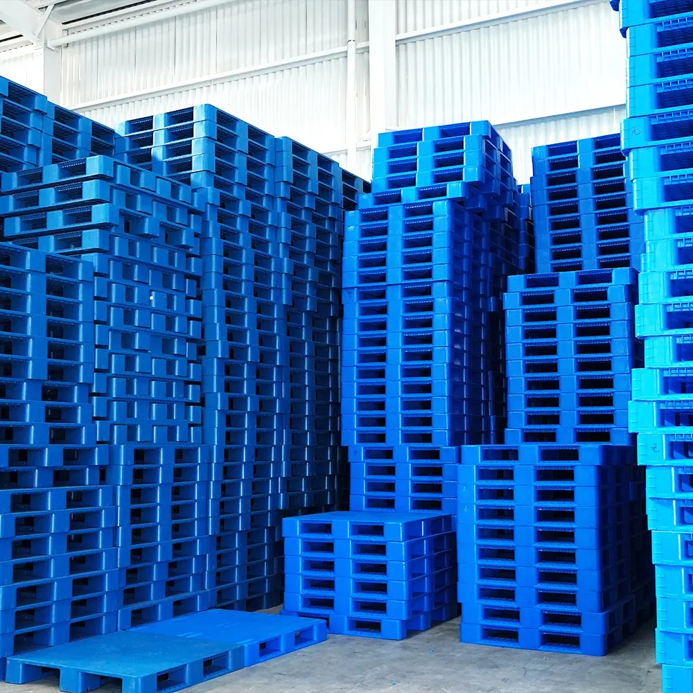อุตสาหกรรมหนักพลาสติกแบนเก้าฟุต HDPE สีฟ้าพาเลทคลังสินค้าจัดเก็บโลจิสติกพาเลทเหล็กสำหรับขาย