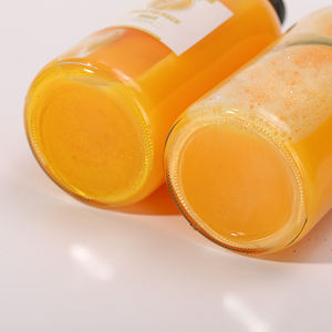 Botella de Vidrio Transparente Redonda de 500 ml para Jugo de Frutas, Bebidas, Agua, con Tapa Metálica de Rosca - Product Image 4