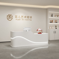 Bureau de réception de luxe à motif de marbre blanc de taille personnalisable avec plusieurs espaces de rangement à l'avant pour le magasin du salon