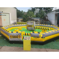 Jeux de machine pour enfants en plein air tournant avec carrousel jeux de sport gonflables jeu d'obstacles rotatifs gonflables