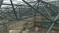 Bâtiment d'atelier industriel préfabriqué en structure acier, robuste, avec conception légère et installation rapide