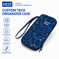 Étui de transport rigide en EVA bleu géométrique personnalisé OEM ODM avec logo, organiseur de technologie portable, sac de voyage, boîte à accessoires antichoc et étanche