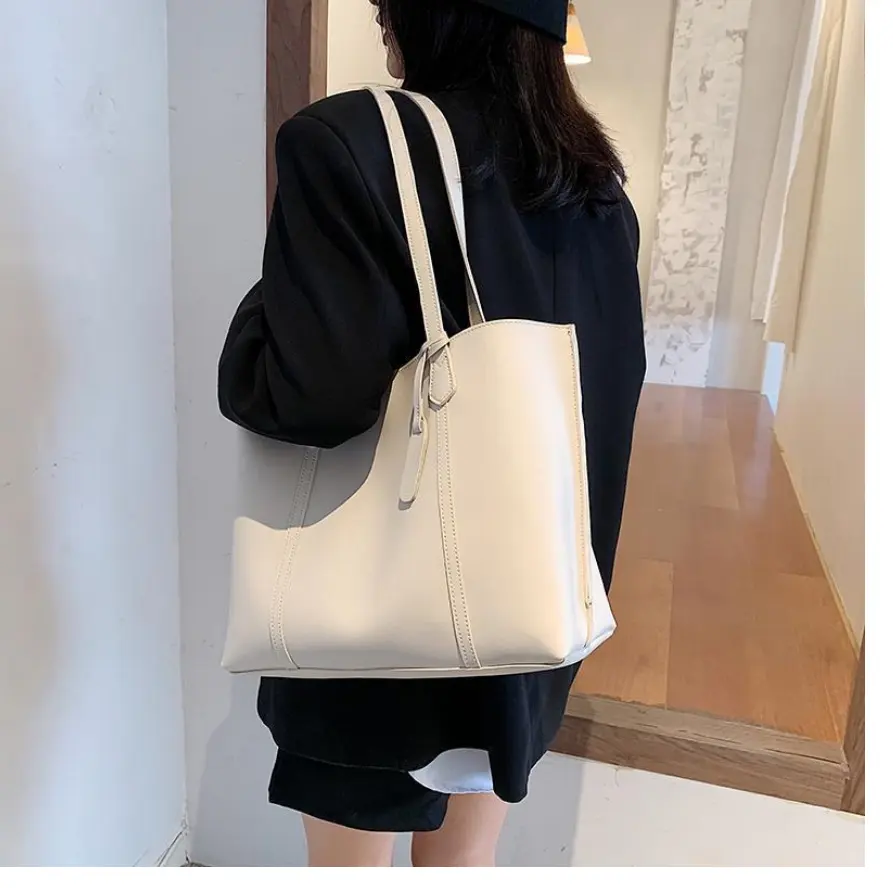 थोक मूल्य महिलाओं के टोट शोल्डर बैग पु चमड़े की बड़ी क्षमता वाली लेडी टोट हैंड बैग