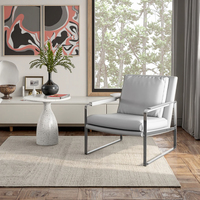 Fauteuil de luxe et design pour les loisirs, modèle paresseux, avec cadre en acier inoxydable, cuir véritable pour le salon, hôtel, villa, bar.