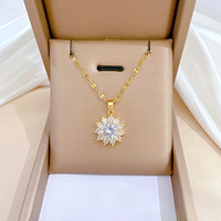 Ensemble de bijoux tendance pour femmes en acier titane plaqué or avec motif de tournesol et cristaux en strass, ensemble collier et boucles d'oreilles