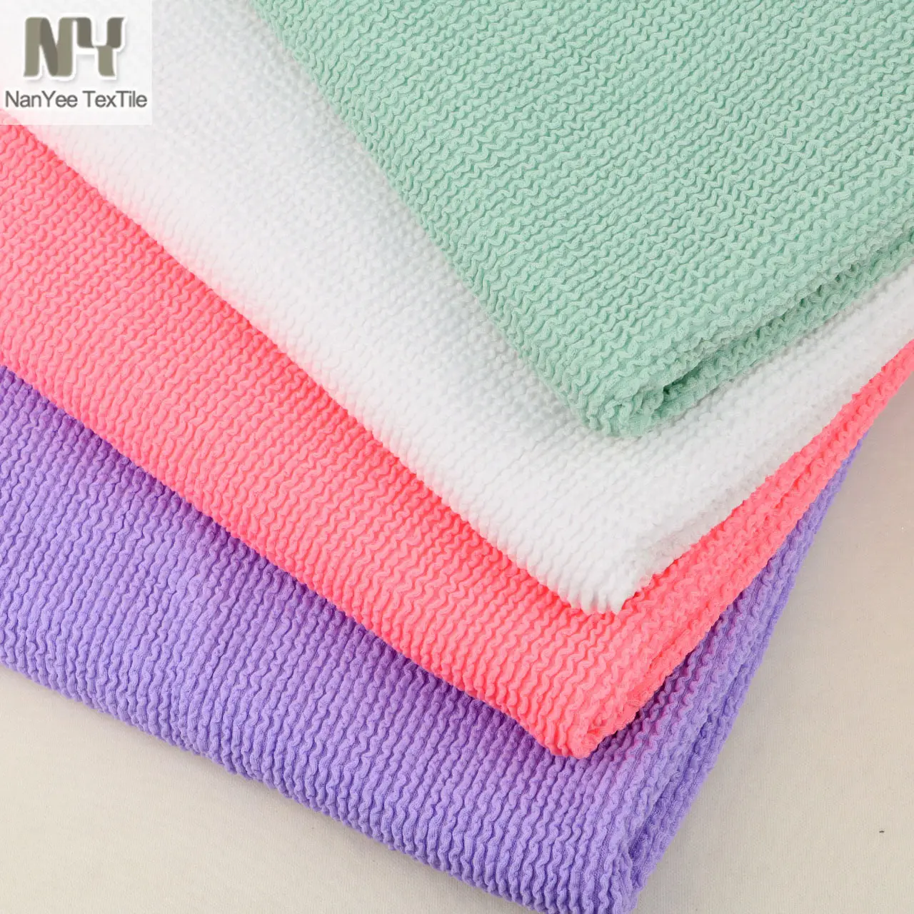 Nanyee Textile Heavy Weight Knitted Jacquard 4 Way Stretch Polyester Seersucker Fabric For Swimwear