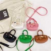 Sac à main mini tendance pour enfants en cuir PU, petit sac bandoulière avec sangle réglable, sac à bandoulière mignon pour femmes avec décoration étoile