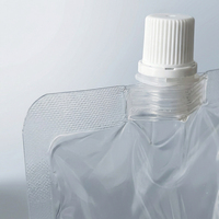 Pochette souple transparente en PE de 0,2 mm anti-fuite avec bec verseur central pour l'emballage de jus et de boissons liquides