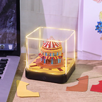 Bloc-notes calendrier 2027 thème Cirque, avec motifs de toit de carrousel et tour, notes en papier découpé, cube lumineux tactile pour affichage sur bureau