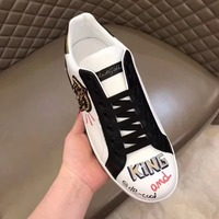 Sneakers en cuir véritable blanc et noir de créateur, style streetwear haut de gamme, confortables, décontractées, antidérapantes, pour hommes, en TPU, pour l'hiver