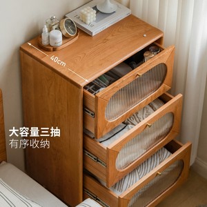 Commode en bois massif de 40 cm de large, armoire de rangement à trois tiroirs, meuble de chambre à coucher avec design à panneaux en verre - Product Image 1