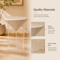 Moderner Umweltfreundlicher Runder Couchtisch mit Glänzender Oberfläche und Transparenter Acryl-Kreuzbasis für Wohnzimmer