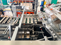 Machine d'emballage automatique pour rouleaux de film, 30 à 60 boîtes par minute