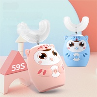 Venta directa OEM 360 ° Cepillo de dientes eléctrico para niños en forma de U para bebés de 2-6-12 años Cerdas suaves de silicona en forma de U