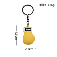 Nuevo Set de Llavero y Abrebotellas 2026: Mini Guantes de Boxeo de PVC Ecológicos con Diseño de Puño de Lucha Sanda