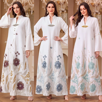 Robe longue musulmane élégante à col montant, imprimé floral, en polyester, avec broche métallique et poignets à revers, manches longues, coupe modeste
