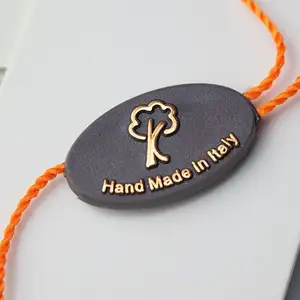 热卖时尚设计定制橙色压花塑料吊牌服装串锁
