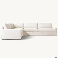 Ensemble de canapés modulaires MAXWELL au design italien classique, en forme de L, avec jupe en tissu éponge, personnalisable et écologique, pour hôtels et appartements
