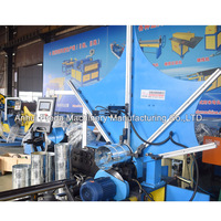 Machine automatique de formage de conduits d'air en spirale Preda avec découpe à la scie, puissance 5,5+4 kW, épaisseur de tôle 0,5-1,2 mm