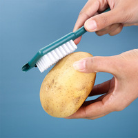 Multifunctionele handmatige fruit- en groenteborstel met roestvrijstalen borstelharen, 3-in-1 schil-, ontpit- en reinigingsgereedschap