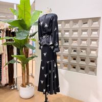 Nouvel ensemble robe style rétro automne pour femme : haut à col en V et manches longues amincissant la taille, et jupe queue de poisson