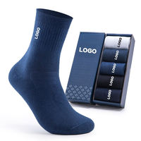 Chaussettes de football personnalisées avec logo d'usine, chaussettes de sport athlétiques de basketball en gros pour acheteurs mondiaux