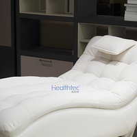 Fauteuil à bascule ergonomique avec coussin moelleux, structure en bois/métal, chaise à bascule de détente pour salon, chambre, balcon