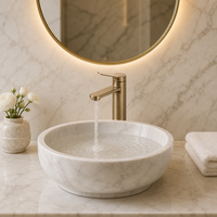 Robinet de lavabo monocommande contemporain en laiton brossé doré, à montage sur plan, avec cartouche céramique