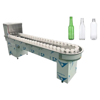 Rinceur de bouteilles en plastique PET rotatif semi-automatique à haute pression pour le nettoyage du lavage des bouteilles de vin et d'eau