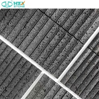Carreaux muraux cannelés en pierre volcanique naturelle HZX Revêtement vertical en roche de lave rainuré Panneaux de marbre résistants au feu