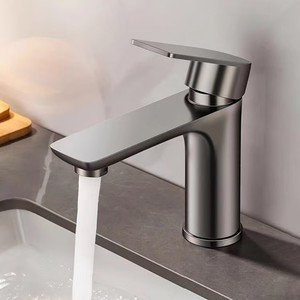 Grifo de lavabo de acero inoxidable con una sola manija, montado en el encimera, con válvula de cerámica, para lavabo de baño. - Product Image 1