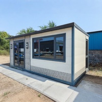 Maison conteneur préfabriquée modulaire en acier de 20 pieds avec mur rideau en verre pour bureau, studio, jardin, extérieur